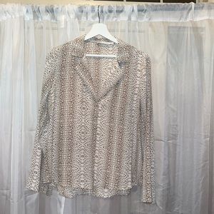All In Favor long sleeve cheetah print shirt. Cute for the office or brunch.